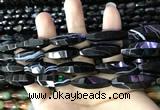 CAA2656 15.5 inches 10*30mm faceted rice banded black agate beads