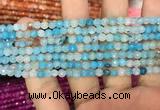 CAA2842 15 inches 4mm faceted round fire crackle agate beads wholesale