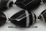 CAA286 22*30mm twisted & faceted oval black line agate beads