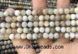 CAA3582 15.5 inches 6mm round ocean fossil agate beads wholesale