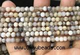 CAA3586 15.5 inches 4mm round matte ocean fossil agate beads