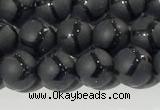 CAA3655 15.5 inches 6mm round matte & carved black agate beads