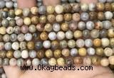 CAA4934 15.5 inches 6mm round yellow crazy lace agate beads wholesale