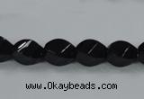 CAB335 15.5 inches 8*12mm faceted & twisted rice black agate beads