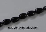 CAB744 15.5 inches 6*8mm flat teardrop black agate gemstone beads