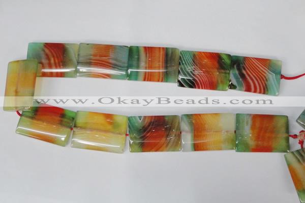 CAG1057 15.5 inches 25*35mm flat tube rainbow agate beads