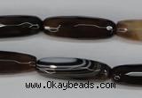 CAG1345 15.5 inches 10*30mm faceted rice line agate gemstone beads