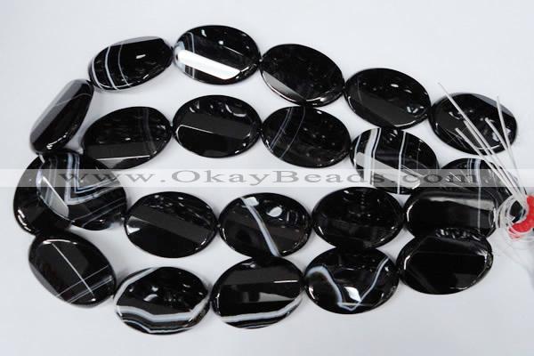 CAG3087 15.5 inches 25*35mm faceted oval black line agate beads