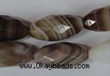 CAG3130 15.5 inches 12*25mm faceted rice brown line agate beads