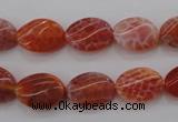 CAG4238 15.5 inches 10*14mm twisted oval natural fire agate beads