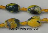 CAG5774 15 inches 10*14mm faceted rice fire crackle agate beads