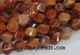 CAG581 15.5 inches 8*12mm faceted & twisted rice natural fire agate beads