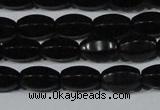 CAG6029 15.5 inches 6*10mm faceted rice matte black agate beads