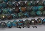 CAG9480 15.5 inches 4mm faceted round blue crazy lace agate beads