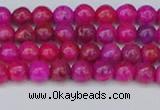 CAG9924 15.5 inches 4mm round fuchsia crazy lace agate beads