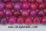 CAG9925 15.5 inches 6mm round fuchsia crazy lace agate beads