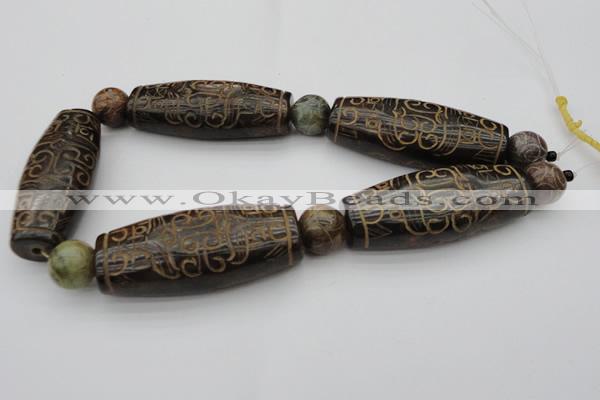 CAL03 14.5 inches 25*60mm carved drum agalmatolite beads