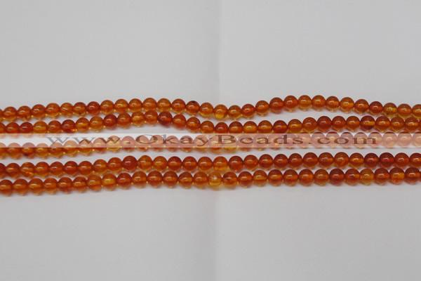 CAR111 15.5 inches 4mm round natural amber beads