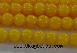 CAR401 15.5 inches 6mm round synthetic amber beads wholesale