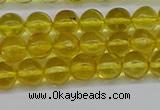 CAR559 15.5 inches 6mm - 6.5mm round natural amber beads wholesale