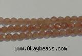 CBQ08 15.5 inches 6mm faceted round strawberry quartz beads