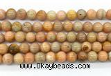 CCA553 15.5 inches 10mm round peach calcite gemstone beads