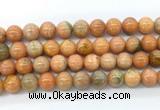 CCA554 15.5 inches 12mm round peach calcite gemstone beads