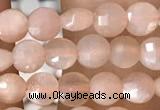 CCB543 15.5 inches 4mm faceted coin peach moonstone beads