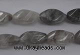 CCQ295 15.5 inches 10*18mm faceted & twisted rice cloudy quartz beads