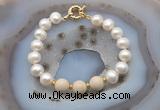 CFB1043 Hand-knotted 9mm - 10mm potato white freshwater pearl & white fossil jasper bracelet