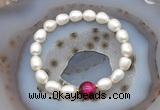 CFB916 9mm - 10mm rice white freshwater pearl & red tiger eye stretchy bracelet