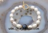 CFB979 Hand-knotted 9mm - 10mm rice white freshwater pearl & blue tiger eye bracelet