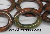 CFG271 15.5 inches 24*30mm carved oval unakite gemstone beads