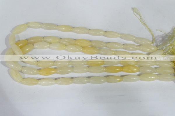 CFG552 15.5 inches 8*20mm carved rice yellow aventurine beads