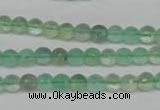 CFL115 15.5 inches 6mm faceted round green fluorite beads