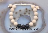 CGB6670 10mm round white fossil jasper & black lava adjustable bracelets