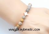 CGB9434 8mm, 10mm matte fossil coral & cross hematite power beads bracelets