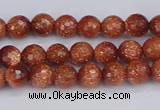 CGS470 15.5 inches 4mm faceted round goldstone beads wholesale