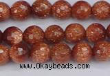 CGS471 15.5 inches 6mm faceted round goldstone beads wholesale