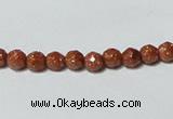 CGS88 15.5 inches 4mm faceted round goldstone beads wholesale