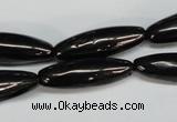 CJB54 15.5 inches 10*30mm rice natural jet gemstone beads