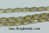 CLQ10 15.5 inches 6*10mm faceted rice natural lemon quartz beads