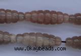 CMS135 15.5 inches 10*30mm carved rice natural moonstone beads