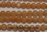 CMS701 15.5 inches 6mm round peach moonstone beads wholesale