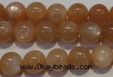 CMS703 15.5 inches 10mm round peach moonstone beads wholesale