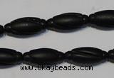 CNE15 15.5 inches 9*20mm carved rice black stone needle beads wholesale