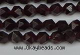 CNG7275 15.5 inches 6mm faceted nuggets red garnet beads