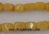 CNG807 15.5 inches 9*12mm faceted nuggets yellow jade beads