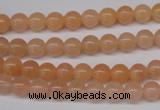 CPE02 15.5 inches 6mm round peach stone beads wholesale