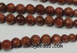 CRO736 15.5 inches 6mm – 14mm faceted round goldstone beads